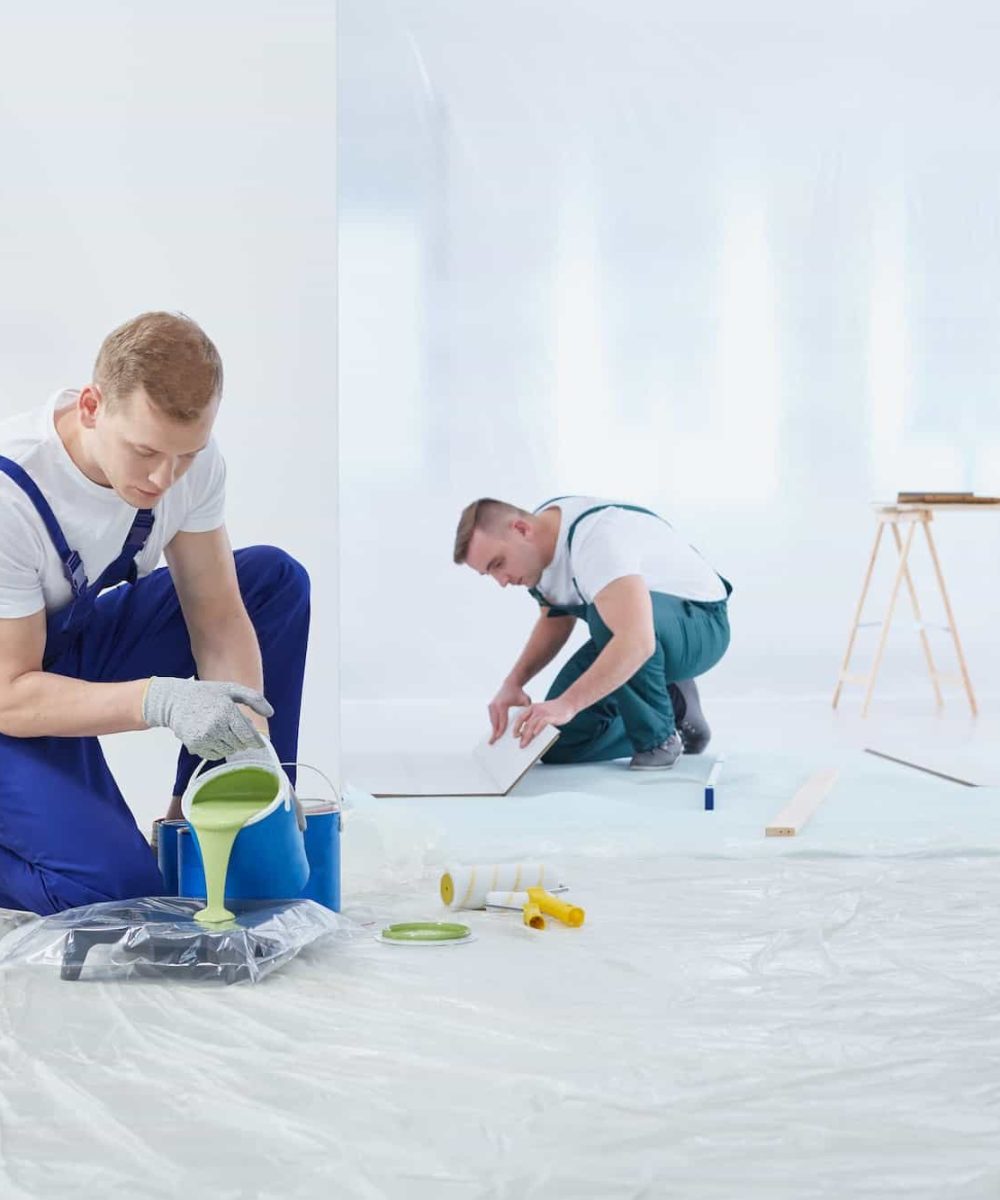 two-painters-painting-the-wall.jpg